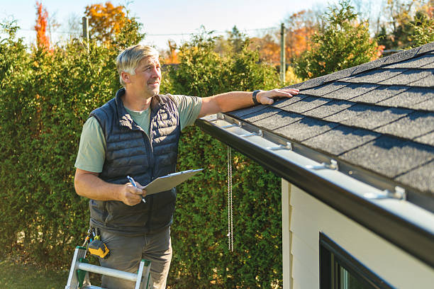 Professional Roof Replacement technician working in Lennon, MI